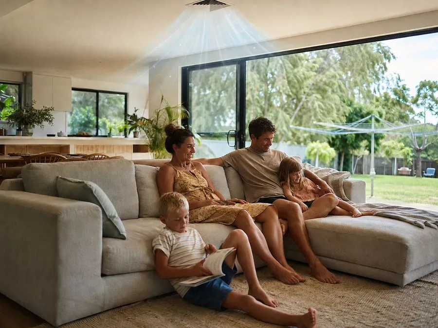 Family relaxing in a cool home on a hot day